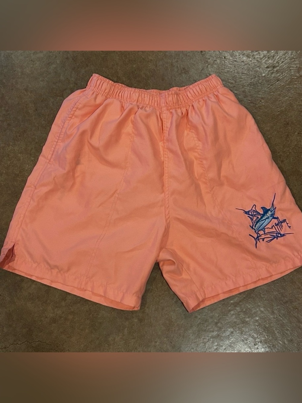 Coral Pink Swim Shorts with Black Logo Tag